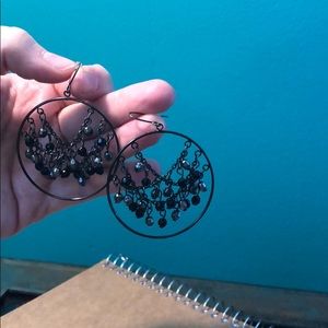 Pair of black and gray dangle earrings